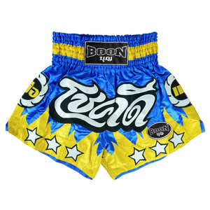 Boon traditional Muay Thai shorts in blue and yellow with bold Thai script and star accents