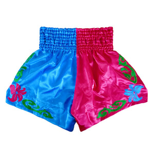 Back view of Boon Traditional Muay Thai shorts, blue and red with floral embroidery