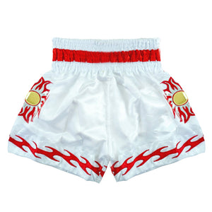 White Muay Thai shorts with red flames and gold sun patch, elastic red waistband