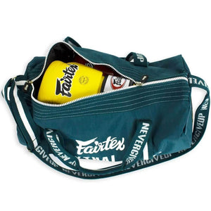 Fairtex barrel gym bag with yellow Fairtex boxing gloves inside, Muay Thai gear bag