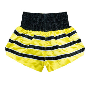 Top King Muay Thai shorts in yellow and black bee stripe design on white background.
