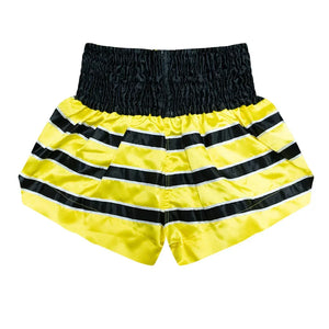 Top King Muay Thai shorts in yellow and black bee stripe design on white background.