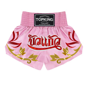 Top King Muay Thai shorts pink with red Thai script and gold accents, Thailand design