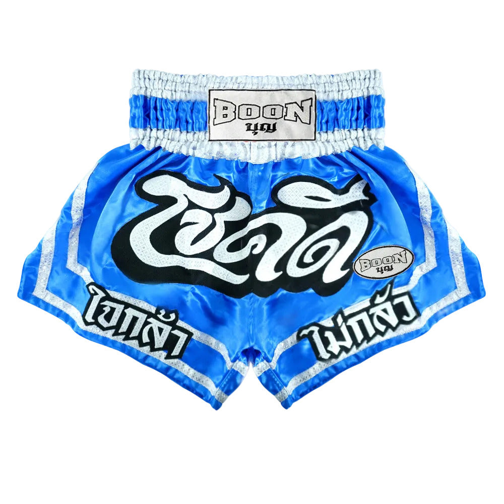 Blue Boon traditional Muay Thai shorts with bold white Thai script and logo patch