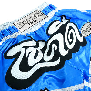 Blue Boon traditional Muay Thai shorts with silver accents and embroidered detailing