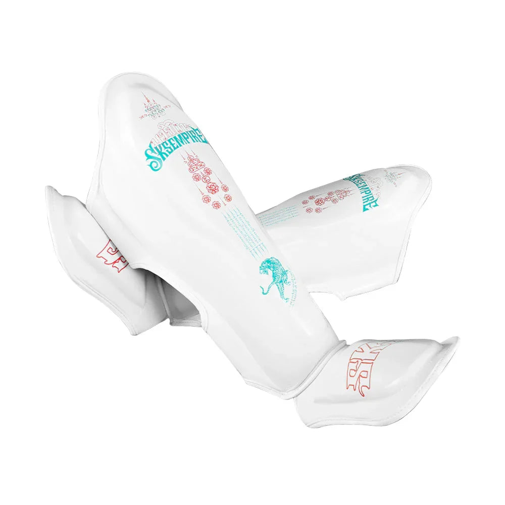 White SKS Empire microfiber Muay Thai shin pads with tiger and temple graphics