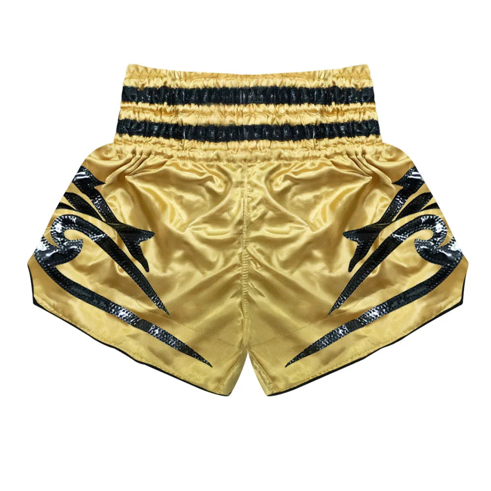Gold Muay Thai shorts with black tiger graphics and black waistband stripes