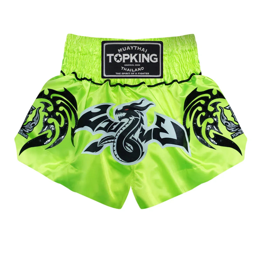 Top King Muay Thai shorts in neon green with black dragon design and logo patch